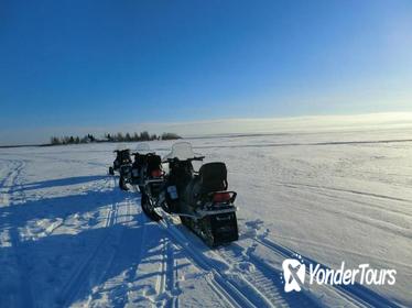 Snowmobile Safari in the Arctic Circle with Hotel Transport from Rovaniemi