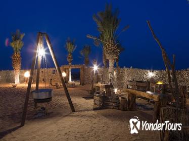 Overnight Desert Camp Experience: Dinner, Emirati Activities, and Vintage Land Rover Transport from Dubai