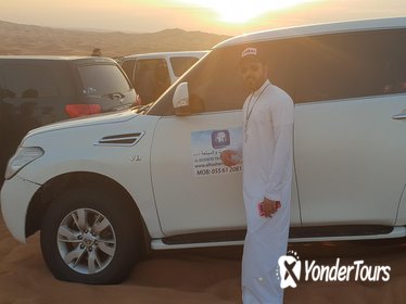 Dubai Morning Desert Safari with Falcon and Sand Boarding