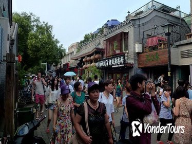 Nanluoguxiang and Local people living Hutong with Courtyard BAR with snacks