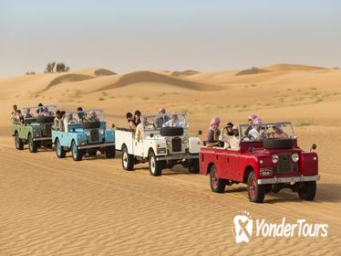 Desert Experience: Dinner and Emirati Activities with Vintage Land Rover Transport from Dubai