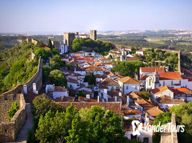 Faith and Heritage: Fátima, Batalha, Nazare, and Óbidos Small-Group Tour from Lisbon